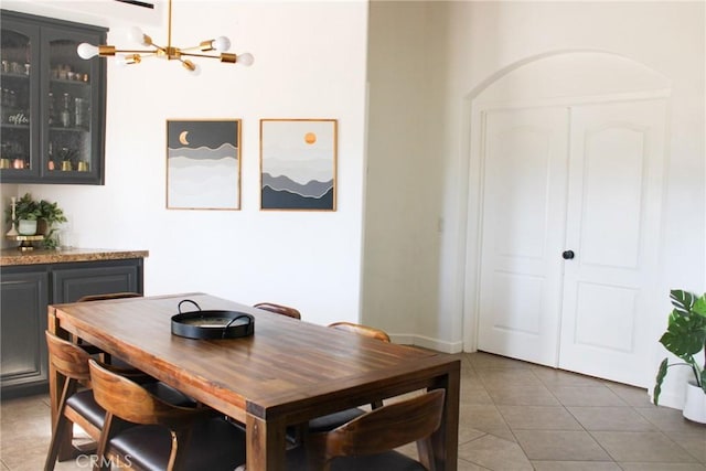 7525 Whitney Ave, Yucca Valley, CA 92284 - dining space with light tile patterned flooring and a chandelier