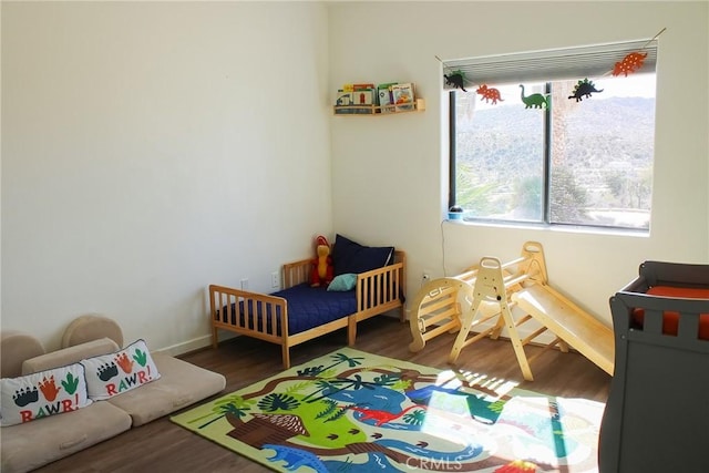 7525 Whitney Ave, Yucca Valley, CA 92284 - bedroom featuring wood finished floors and baseboards