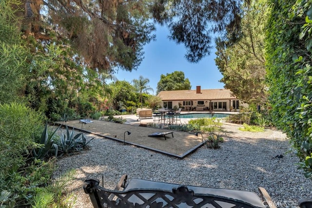 9604 Tunney Ave, Northridge, CA 91324 - view of yard featuring an outdoor pool and a patio