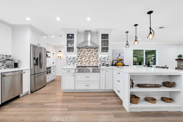 9604 Tunney Ave, Northridge, CA 91324 - kitchen with stainless steel appliances, wall chimney range hood, open shelves, backsplash, and white cabinetry