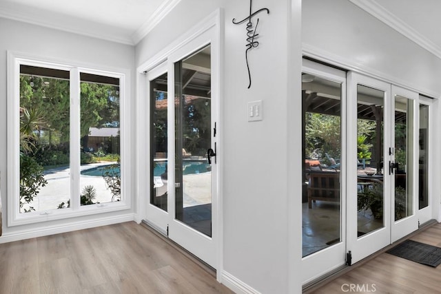 9604 Tunney Ave, Northridge, CA 91324 - doorway with ornamental molding, wood finished floors, and french doors