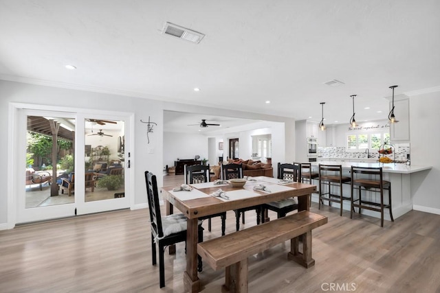 9604 Tunney Ave, Northridge, CA 91324 - dining room featuring ceiling fan, light wood-style flooring, crown molding, and recessed lighting