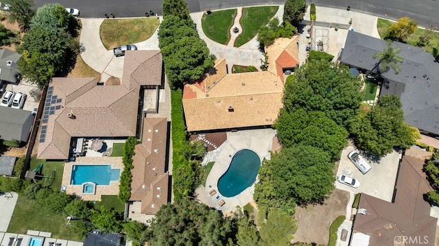 9604 Tunney Ave, Northridge, CA 91324 - drone / aerial view of a pool area