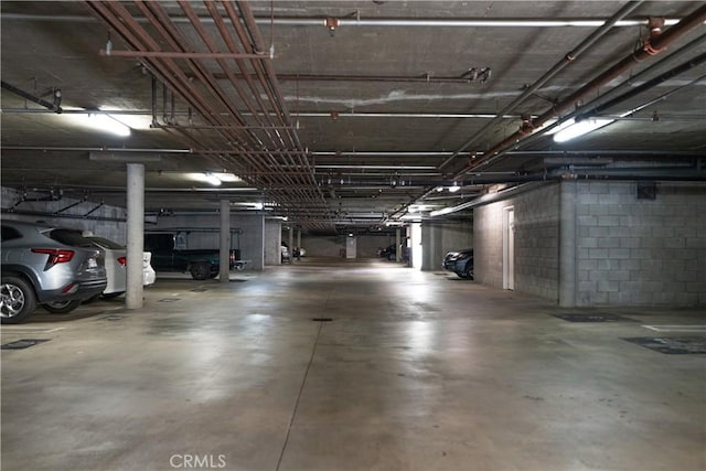 13801 Oxnard St Unit 202, Van Nuys, CA 91401 - parking garage featuring concrete block wall