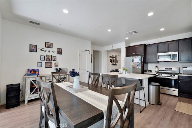453 Daffodil Dr, Merced, CA 95341 - dining room featuring light wood-type flooring and recessed lighting