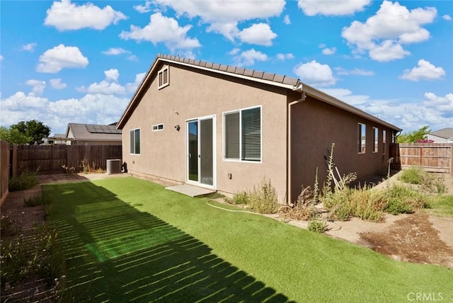 453 Daffodil Dr, Merced, CA 95341 - back of house with a fenced backyard and stucco siding