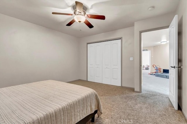 695 Crescent Ln, Lemoore, CA 93245 - bedroom with carpet, a closet, and ceiling fan