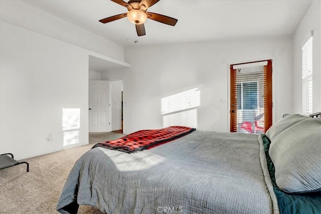695 Crescent Ln, Lemoore, CA 93245 - carpeted bedroom with ceiling fan and access to outside