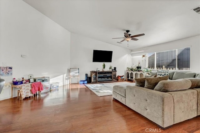 695 Crescent Ln, Lemoore, CA 93245 - living room featuring a ceiling fan, wood finished floors, and lofted ceiling