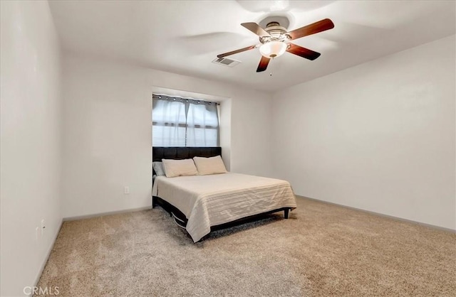 695 Crescent Ln, Lemoore, CA 93245 - carpeted bedroom featuring a ceiling fan