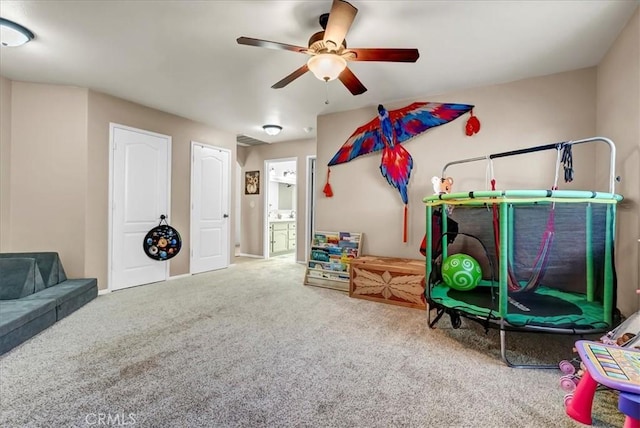 695 Crescent Ln, Lemoore, CA 93245 - recreation room with a ceiling fan and carpet flooring