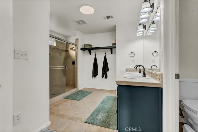 695 Crescent Ln, Lemoore, CA 93245 - full bath featuring tile patterned floors, double vanity, and a shower stall