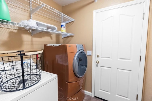 2092 Betsy Ross Ct, Atwater, CA 95301 - washroom featuring baseboards and washing machine and dryer