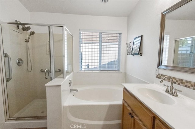 2092 Betsy Ross Ct, Atwater, CA 95301 - bathroom featuring healthy amount of natural light, a bath, a stall shower, and vanity