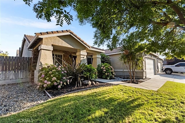 2092 Betsy Ross Ct, Atwater, CA 95301 - single story home with stone siding, stucco siding, a tile roof, concrete driveway, and a garage