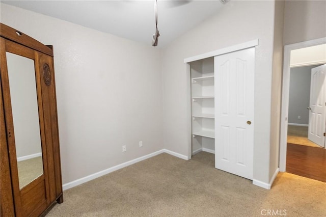 2092 Betsy Ross Ct, Atwater, CA 95301 - unfurnished bedroom with light colored carpet, a closet, lofted ceiling, and a ceiling fan