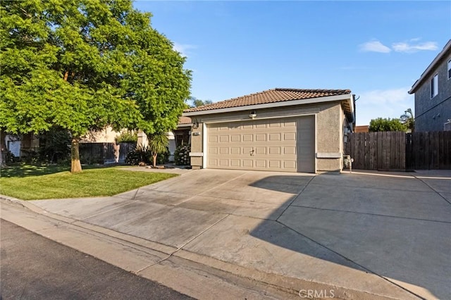 2092 Betsy Ross Ct, Atwater, CA 95301 - ranch-style house with stucco siding, a tiled roof, driveway, and a garage