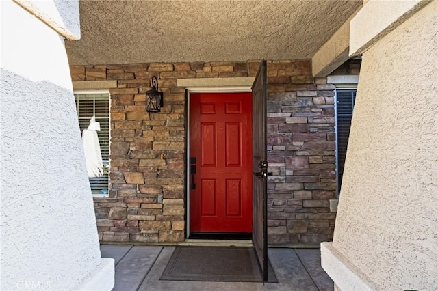2092 Betsy Ross Ct, Atwater, CA 95301 - view of exterior entry featuring stucco siding and stone siding