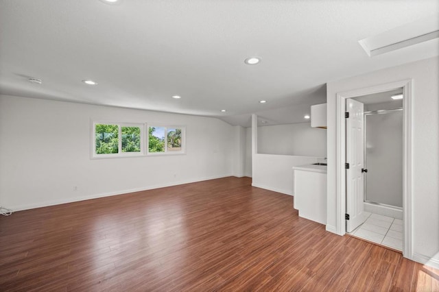 9312 Daisy Ave, Fountain Valley, CA 92708 - basement featuring wood finished floors and recessed lighting