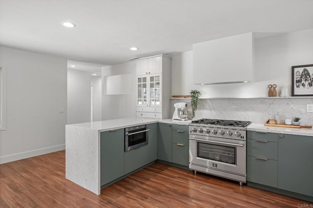 9312 Daisy Ave, Fountain Valley, CA 92708 - kitchen featuring stainless steel appliances, a peninsula, gray cabinets, recessed lighting, and decorative backsplash