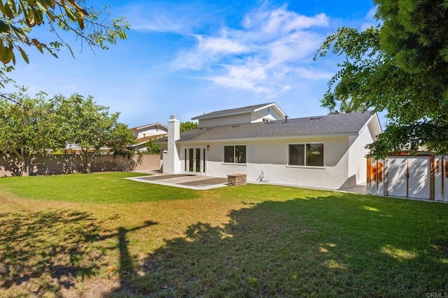 9312 Daisy Ave, Fountain Valley, CA 92708 - back of house with stucco siding, a fenced backyard, a patio, and a shingled roof