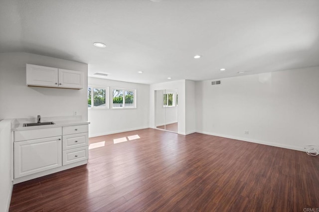 9312 Daisy Ave, Fountain Valley, CA 92708 - unfurnished living room featuring dark wood-type flooring and recessed lighting