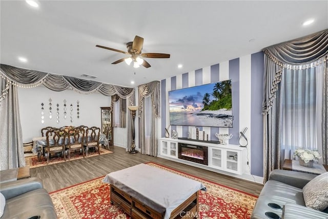 16614 Trailblazer Ave, Chino, CA 91708 - living room featuring a ceiling fan, wood finished floors, recessed lighting, and a glass covered fireplace