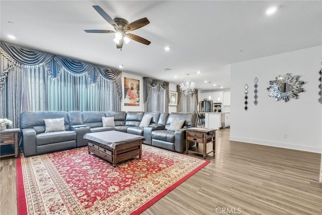 16614 Trailblazer Ave, Chino, CA 91708 - living area featuring ceiling fan, light wood-style flooring, a chandelier, and recessed lighting
