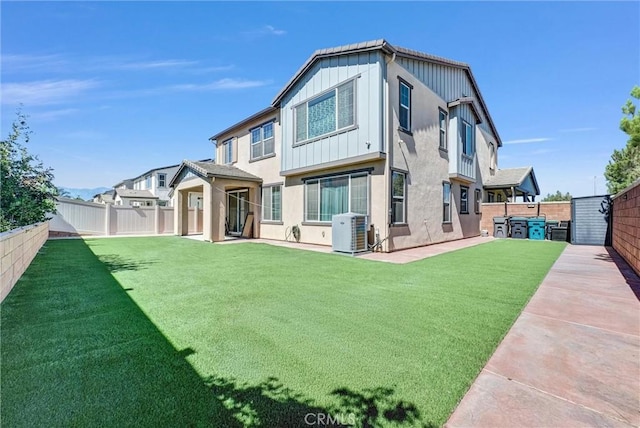 16614 Trailblazer Ave, Chino, CA 91708 - back of house featuring a fenced backyard, a patio, board and batten siding, and stucco siding
