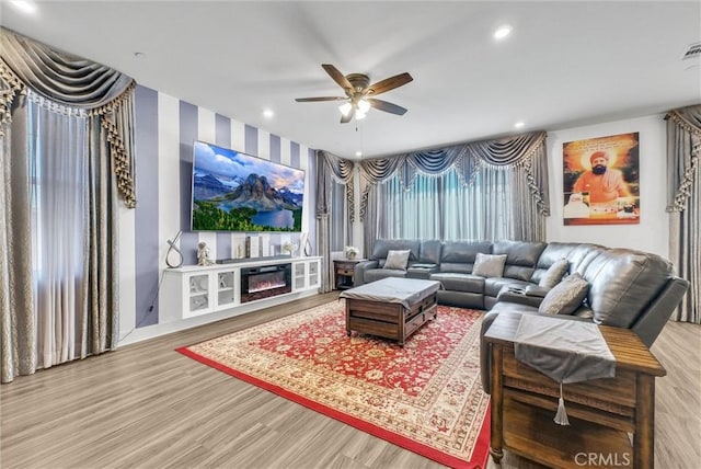 16614 Trailblazer Ave, Chino, CA 91708 - living area with a ceiling fan, wood finished floors, recessed lighting, and a glass covered fireplace