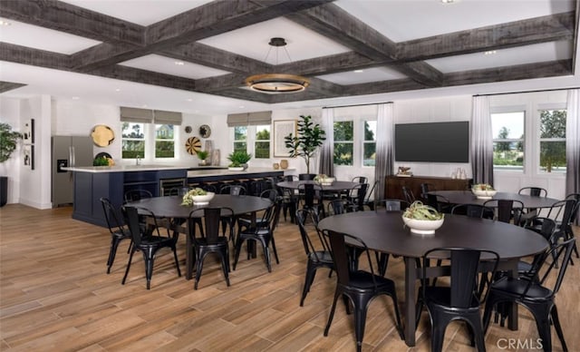 16614 Trailblazer Ave, Chino, CA 91708 - dining space with coffered ceiling, light wood-style flooring, and beamed ceiling