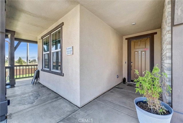 16614 Trailblazer Ave, Chino, CA 91708 - view of exterior entry with stucco siding and covered porch