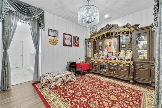 16614 Trailblazer Ave, Chino, CA 91708 - sitting room featuring a chandelier and wood finished floors