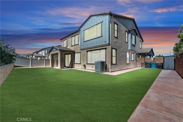16614 Trailblazer Ave, Chino, CA 91708 - back of property at dusk featuring a patio and a fenced backyard