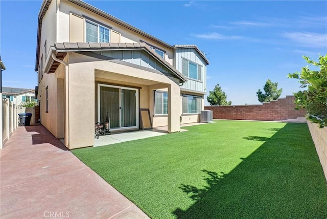 16614 Trailblazer Ave, Chino, CA 91708 - rear view of property featuring board and batten siding, a patio area, a fenced backyard, and stucco siding