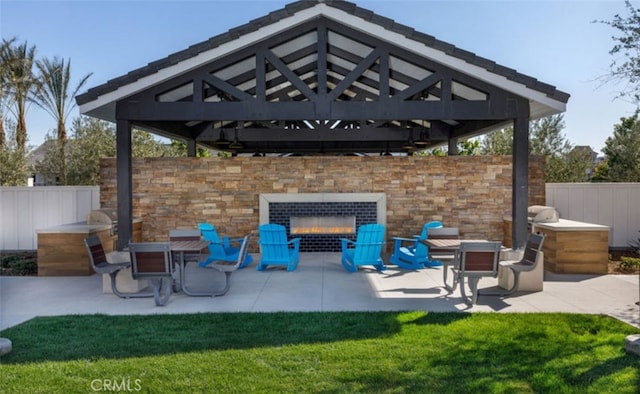 16614 Trailblazer Ave, Chino, CA 91708 - view of patio with a gazebo and a lit fireplace