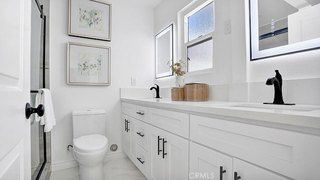 23231 Cheswald Dr, Laguna Niguel, CA 92677 - full bath with double vanity, marble look tile flooring, and an enclosed shower
