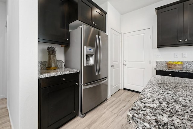 4192 Camino Campana, Oceanside, CA 92057 - kitchen featuring stainless steel fridge, light stone countertops, and light tile patterned flooring