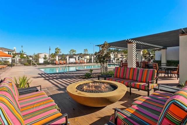 4192 Camino Campana, Oceanside, CA 92057 - community pool with a pergola, a patio area, and an outdoor living space with a fire pit