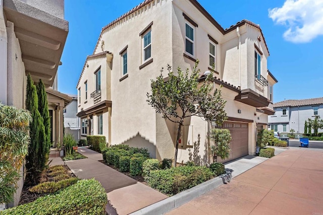 4192 Camino Campana, Oceanside, CA 92057 - view of building exterior featuring an attached garage and driveway