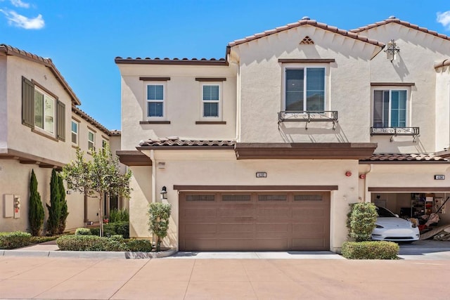 4192 Camino Campana, Oceanside, CA 92057 - mediterranean / spanish-style home with a tiled roof, a garage, stucco siding, and concrete driveway