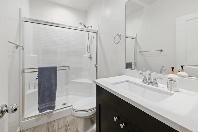 4192 Camino Campana, Oceanside, CA 92057 - bathroom with a shower stall, vanity, and wood finished floors