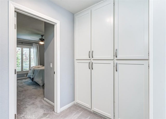 23113 Cherry Ave Unit 15, Lake Forest, CA 92630 - corridor with light carpet and baseboards