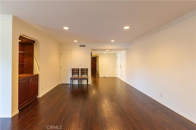 6242 Riviera Cir, Long Beach, CA 90815 - empty room featuring dark wood finished floors, recessed lighting, ornamental molding, and arched walkways