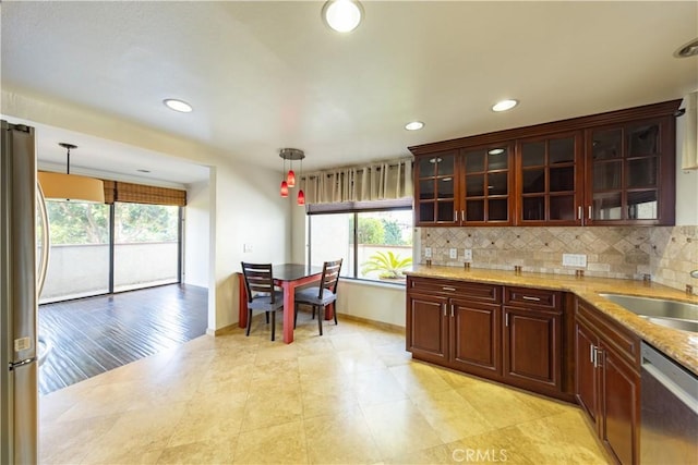 6242 Riviera Cir, Long Beach, CA 90815 - kitchen featuring stainless steel appliances, healthy amount of natural light, hanging light fixtures, and recessed lighting