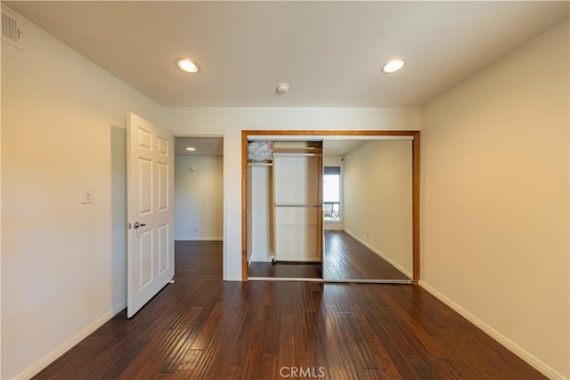 6242 Riviera Cir, Long Beach, CA 90815 - unfurnished bedroom featuring hardwood / wood-style floors, recessed lighting, and a closet
