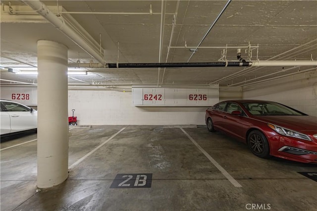 6242 Riviera Cir, Long Beach, CA 90815 - parking deck with concrete block wall