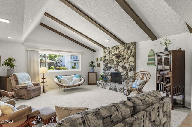 4907 Island View St, Oxnard, CA 93035 - living room featuring a textured ceiling, carpet, and a stone fireplace