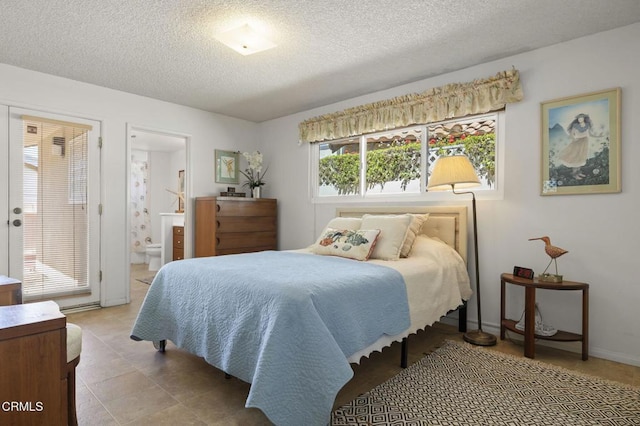 4907 Island View St, Oxnard, CA 93035 - bedroom with a textured ceiling and ensuite bathroom