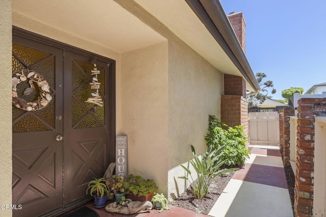 4907 Island View St, Oxnard, CA 93035 - property entrance featuring french doors, stucco siding, and brick siding